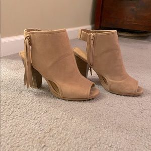 Tan peep toe booties with tassels